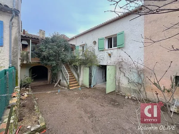 Maison Neoules 5 pièces 125m² avec jardin et deux garages.