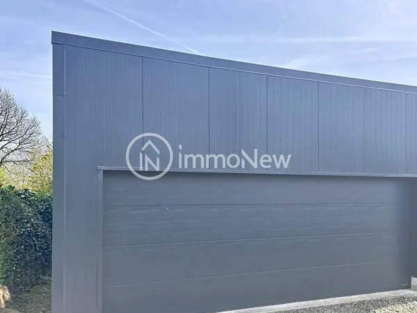 HANGAR NEUF 62 M2 AVEC PORTE SECTIONNELLE SUR TERRAIN ENVIRO
