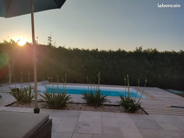 Maison_3 chambres_Piscine_Commerce_Secteur calme