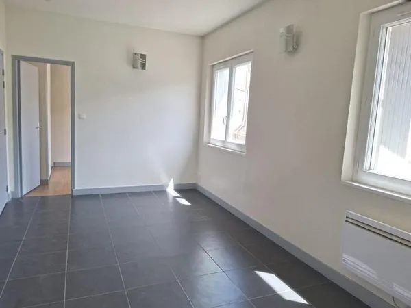 SAINT GAUDENS COQUET T2 CENTRE VILLE EN PARFAIT ETAT AVEC PARKIN