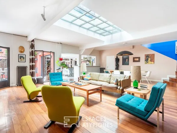 Maison à l'esprit loft avec cour