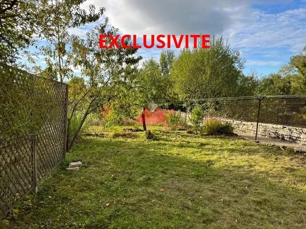 Duplex en plein centre ville avec terrain et garage