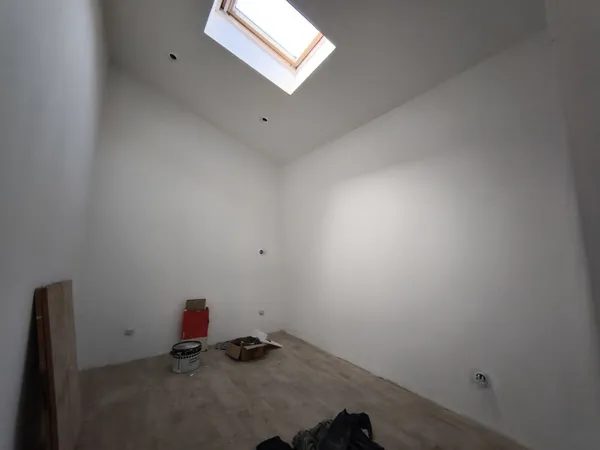 Duplex avec toit terrasse + studio avec travaux
