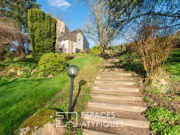 Maison d'architecte familiale 80's et évolutive