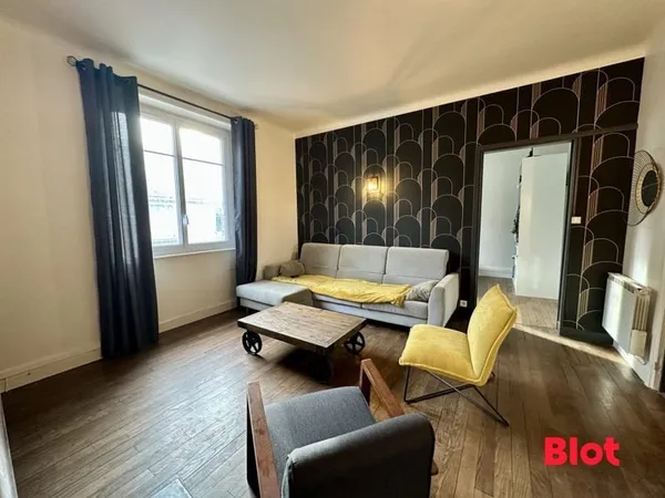 EXCLUSIVITÉ BLOT IMMOBILIER - Appartement 56,05 m² - Hypercentre Montfort-sur-Meu - Parking