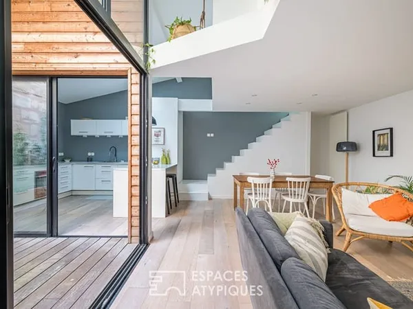 Loft en rez-de-chaussée avec terrasse et grand garage