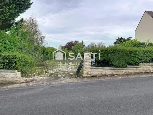 Terrain en 2 lots de 462 m2 chacun - REC C - proche commerces - écoles - quartier résidentiel