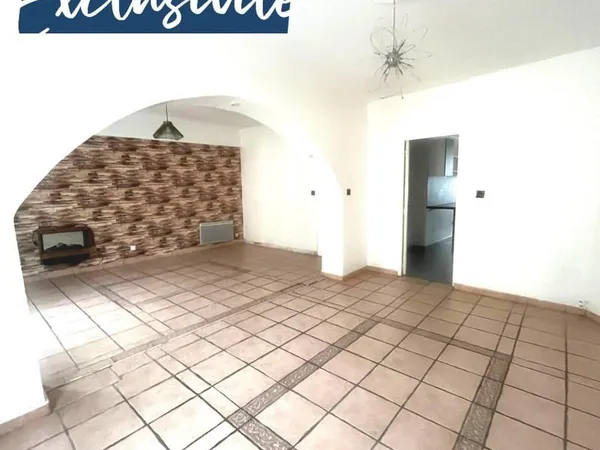 Maison de ville avec un plain pied de vie