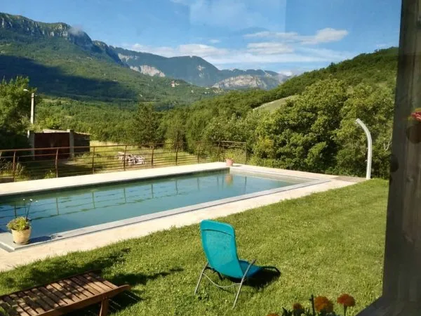 Maison ossature bois avec piscine et étang