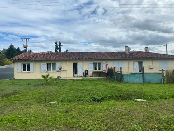 Maison mitoyenne- Idéal investiseur-Deux logements indépendants