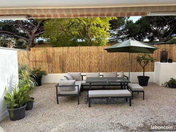 Grand T2 avec jardin et piscine-secteur marché, proche plage