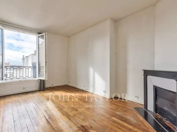Batignolles- Appartement traversant avec belle vue dégagée