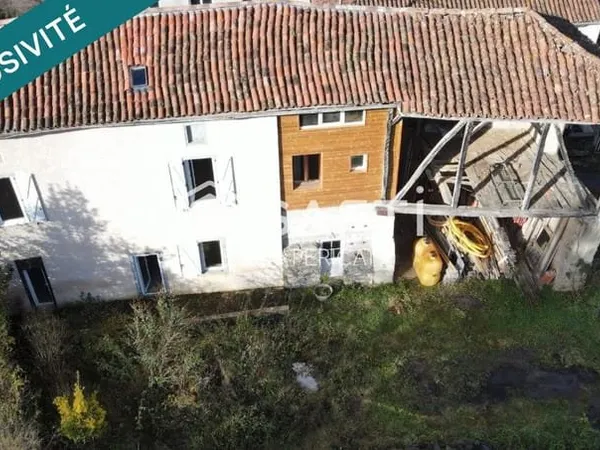 Opportunité de rénovation avec volumes annexes