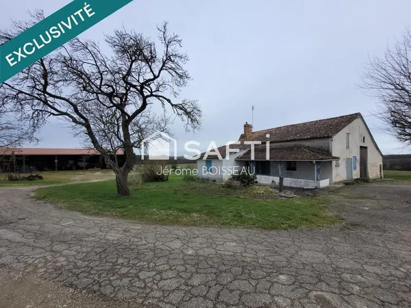 Sur un terrain de 3000 m2 maison et grange