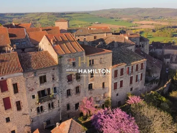 PROPRIETE DE CARACTERE A FORT POTENTIEL MIXTE AU COEUR DE CORDES-SUR-CIEL