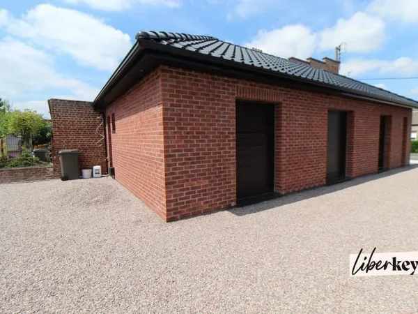 Pavillon de plain pied avec garage camping car