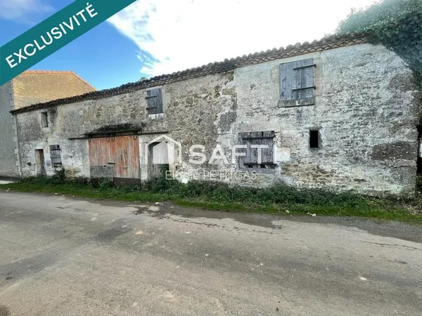 Ancienne maison à rénover totalement dans un environnement calme et verdoyant