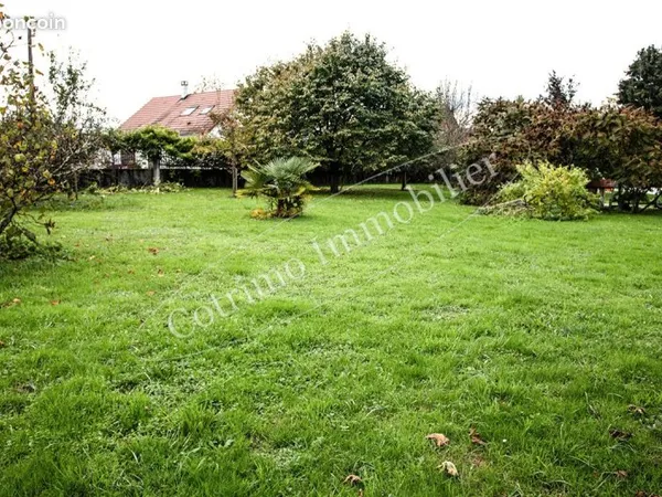 Terrain 1400 m² DOMESSIN