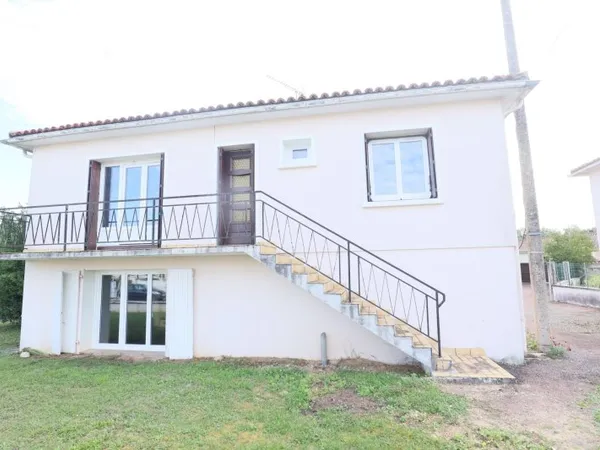 Maison 3 chambres avec atelier/garage sur terrain 940m2