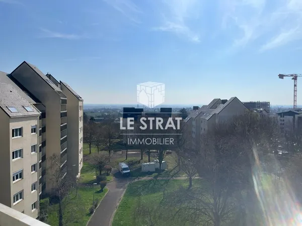 Appartement 4 pièces avec balcon, cave et parking en sous-sol