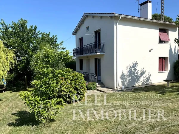 Maison de 100m2 avec 2 garages proche des commodités