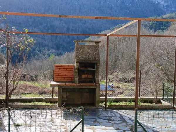 Maison vue sur les montagnes