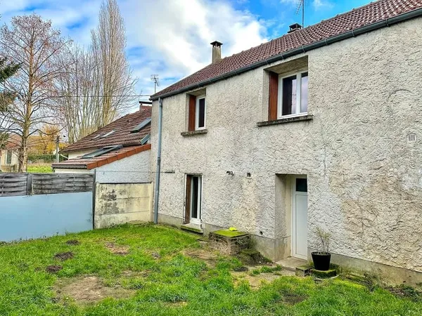 Maison mitoyenne de 3 chambres située en impasse dans le qua