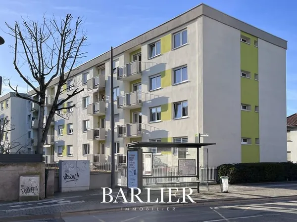 Appartement 3/4 pièces de 78m2 avec deux balcons et un garage à vendre au centre d'Illkirch
