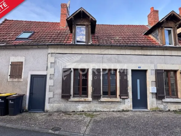 Maison d'env. 100 m² dont 83 m² habitables comprenant 3 chambres.