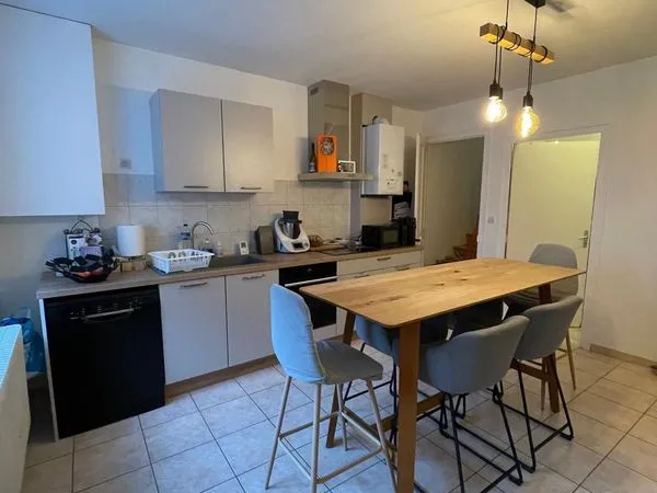 Appartement dans maison mitoyenne