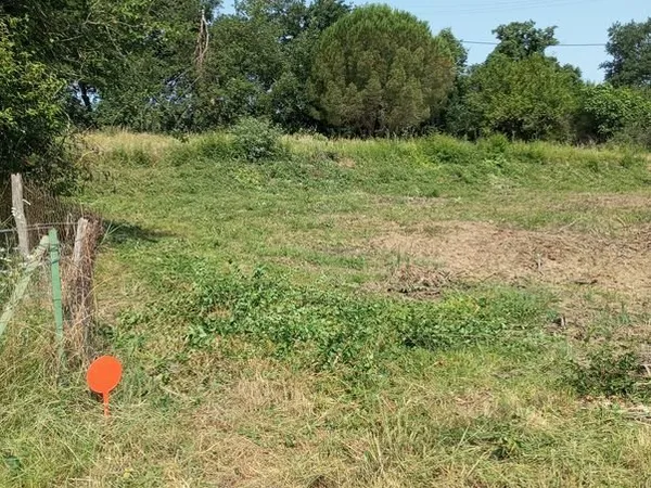 Vends terrain à bâtir