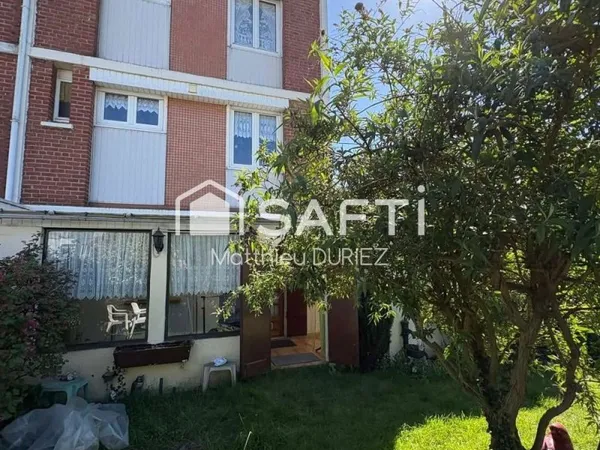 Maison semi-individuelle 120 m² jardin 2 garages