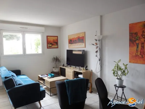 Appartement T3 avec terrasse en 1er étage