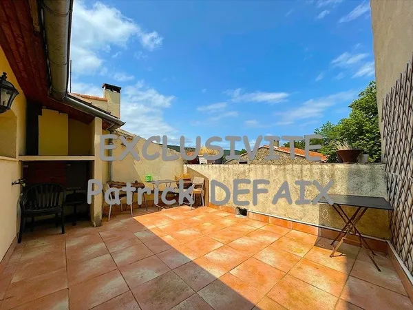 Maison de village avec terrasse de toit