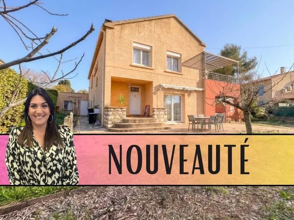 Maison familiale avec appartement T2, grande terrasse et terrain divisible de 927 m²