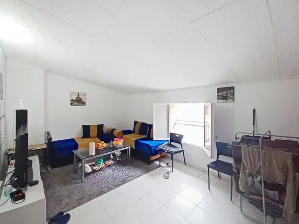 Un immeuble 88 M2 -3T1 bis
