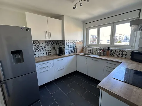 Appartement F4 lumineux, parking