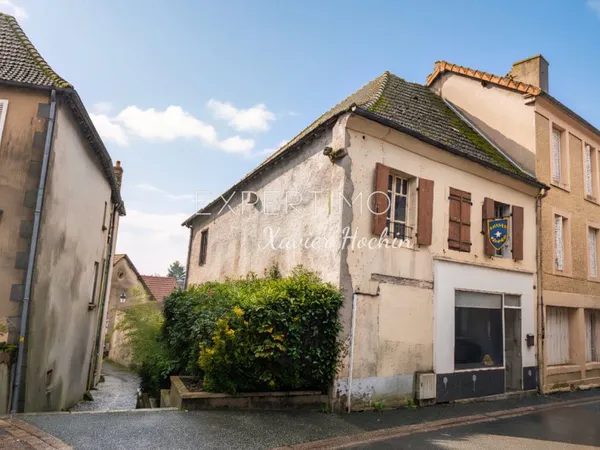 Maison de bourg avec ancien local commercial
