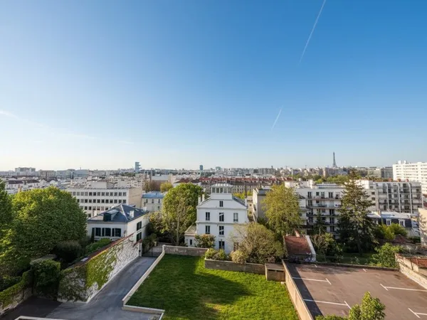 Appartement Courbevoie 4 pièces DPE D vue Paris et Tour Eiffel expo Sud / Sud-est balcon double séjo
