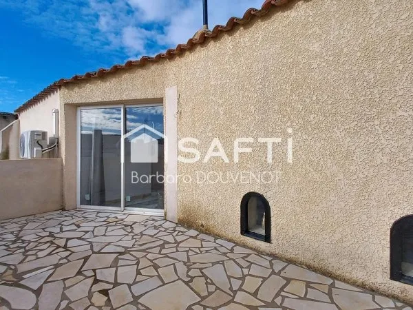 Maison de village de 125 m² - 3 terrasses - grand garage.