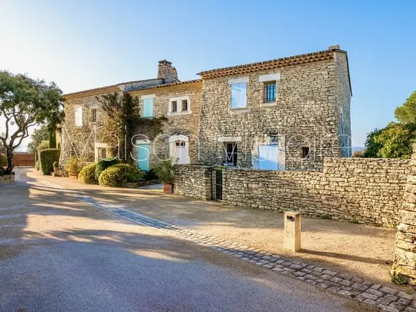 Stone property in Gordes with views and shared pool.