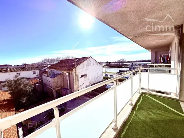 Appartement T3 avec terrasse vue Rhône & box/garage fermé
