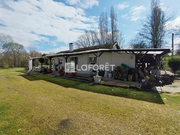 Maison avec 15 Garages Rentables + Terrain Castelmayran