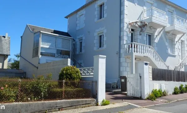 Maison composée de trois appartements