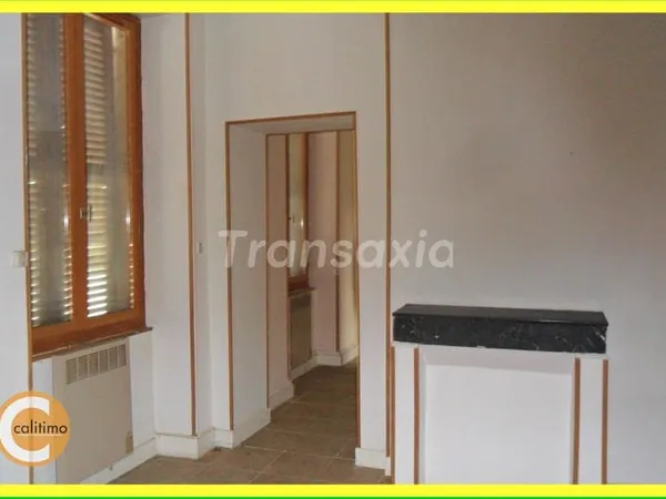 Appartement + Commerce ou autre