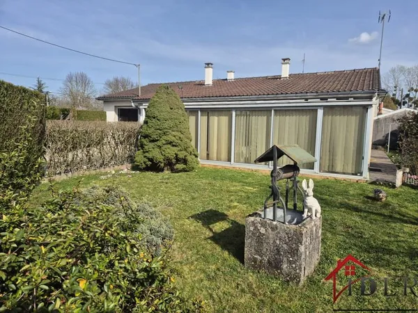 Plain-pied à moderniser de 100m2 avec potentiel 3 chambres