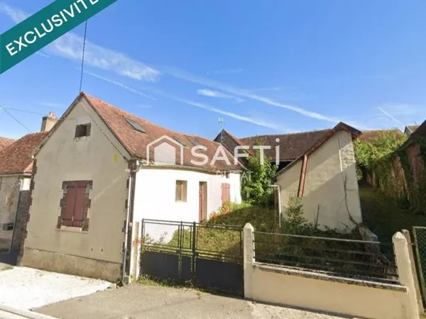 Maison à rénover avec grange.