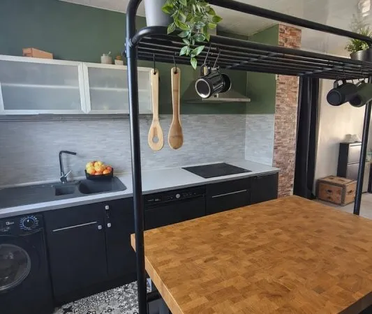 APPARTEMENT TRAVERSANT DE TYPE F3 DE 57,11 M2 CARREZ AVEC BA