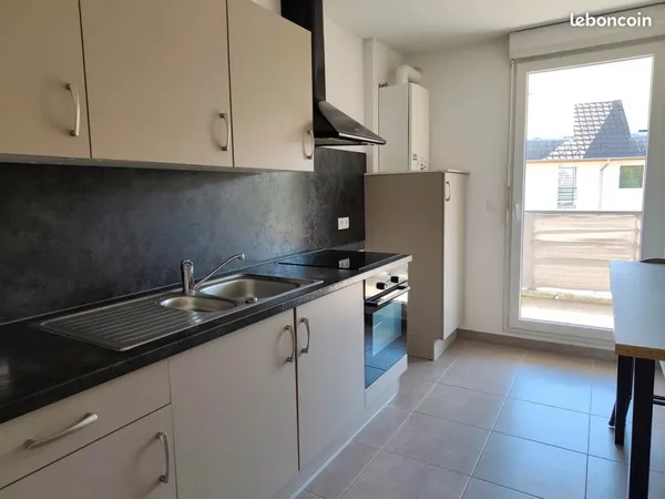 F3 lumineux de 65.34 m² avec balcon, cave, garage et parking