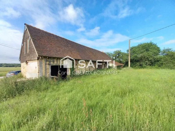 Maison ancienne avec dépendances accolées à rénover